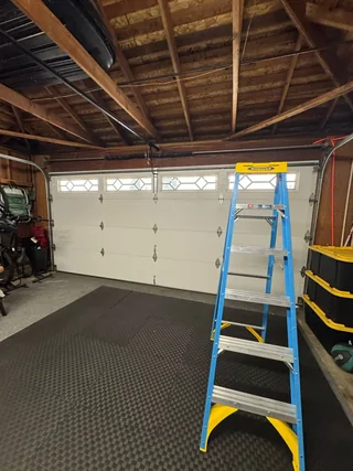 Interior view of a white sectional garage door